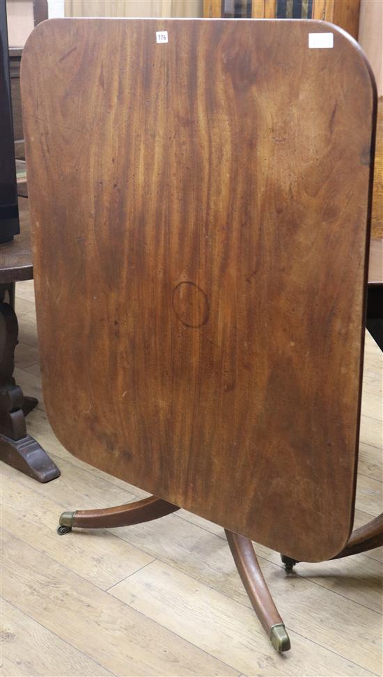 A Regency mahogany tilt top dining table W.99cm